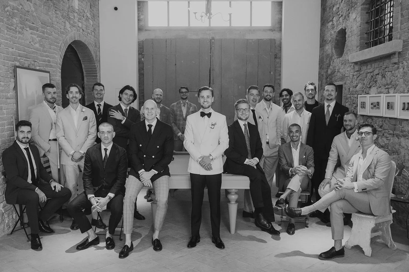 The groomsmen, in black and white