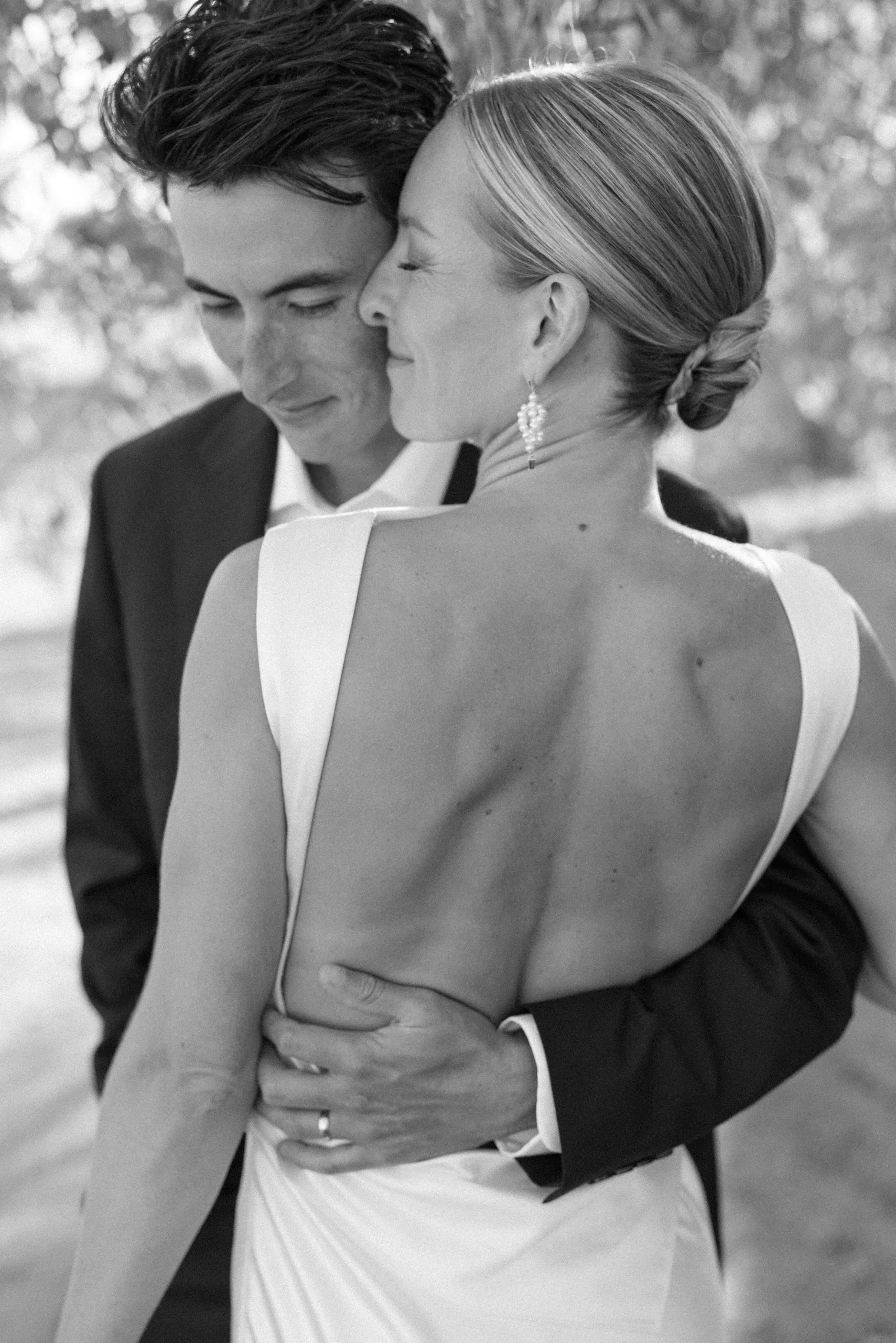 Lindsey and Max kissing, in black and white