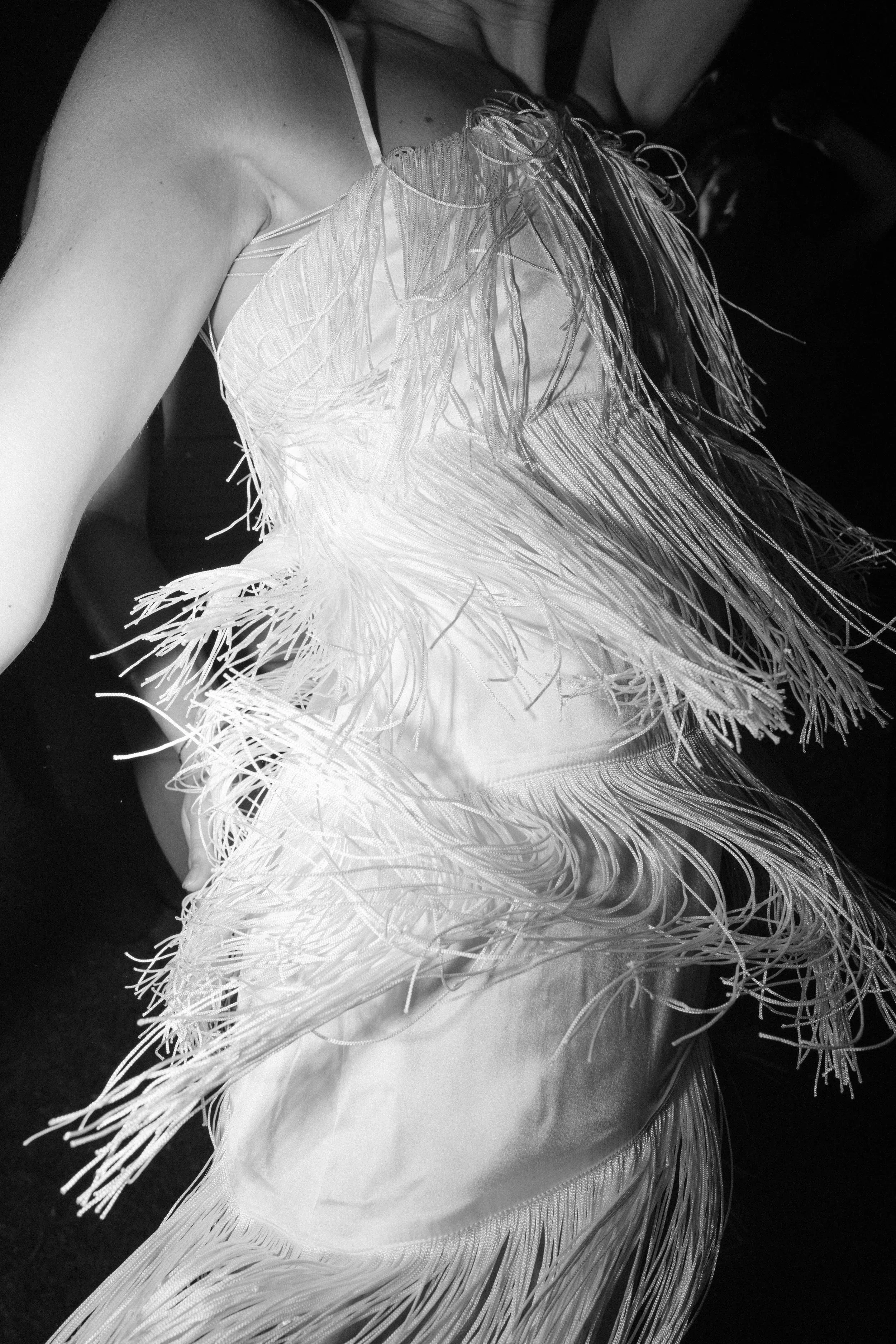 A fringed dress in black and white